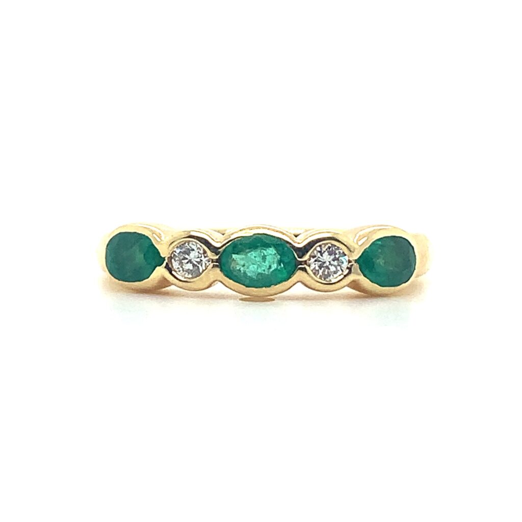 18ct Yellow Gold Emerald and Diamond rub over band ring - Gabriella ...