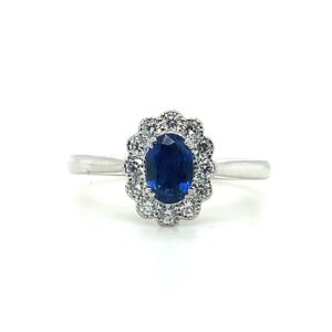 18ct White Gold oval Sapphire with a Diamond halo