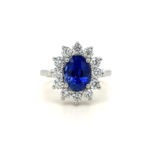 Platinum Sapphire and Diamond Ring. The oval Sapphire weighs 2.79ct. The Diamonds weigh in total 0.84ct